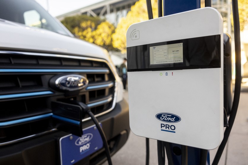White Ford vehicle charging up