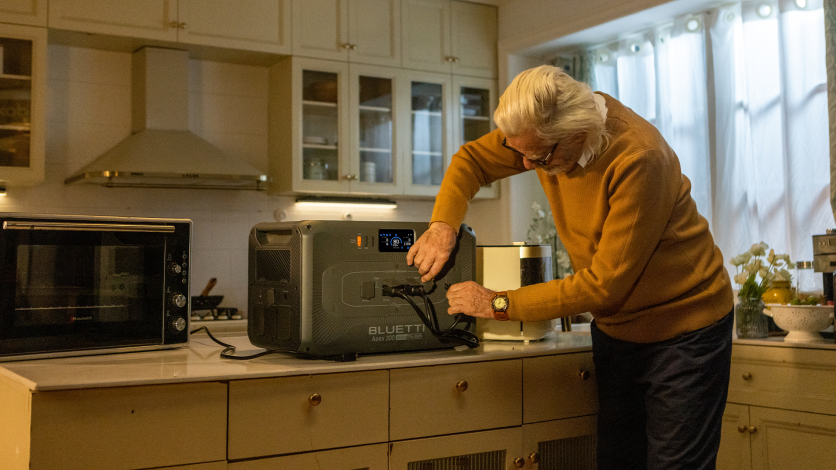 Person pluging appliances into an Apex 300
