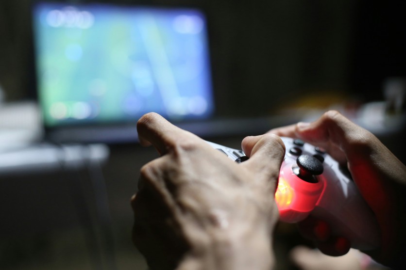 Hands holding a game controller