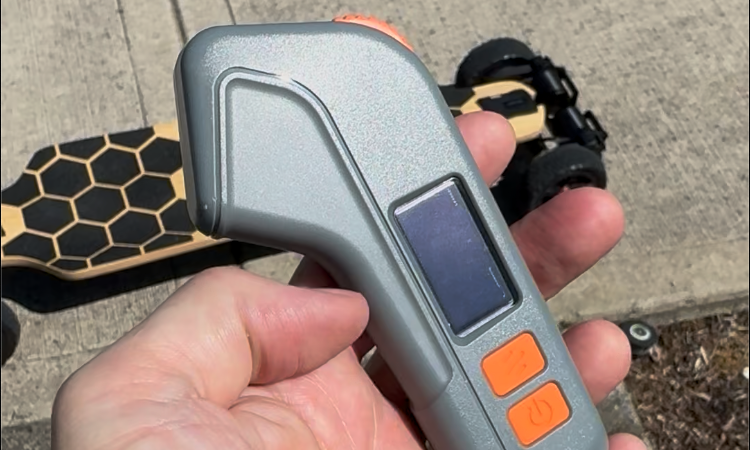 Close-up of Meepo Rover remote with display and control buttons
