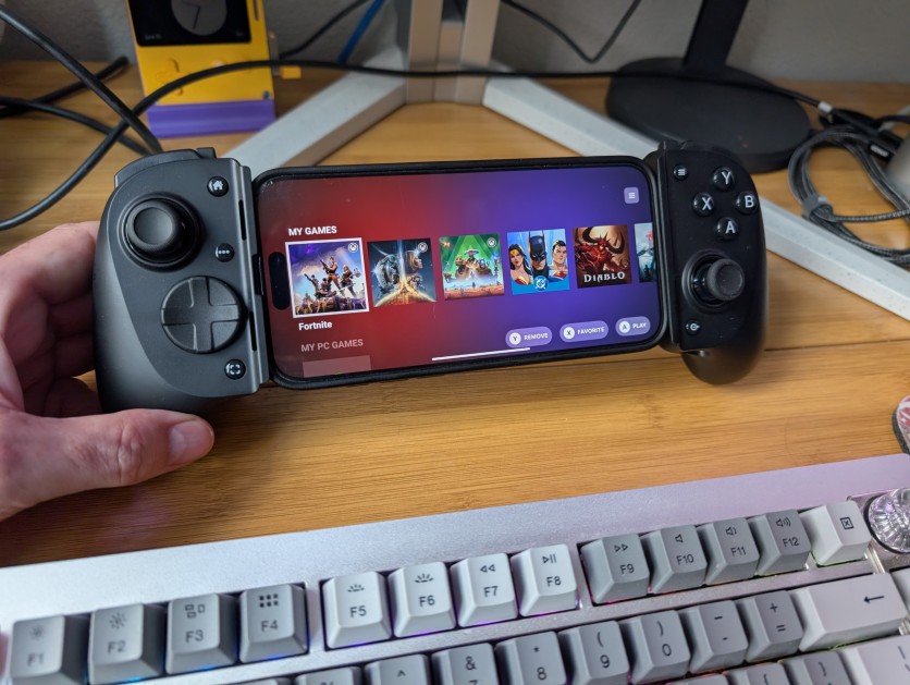 Razer Kishi V3 Pro with phone showing game library