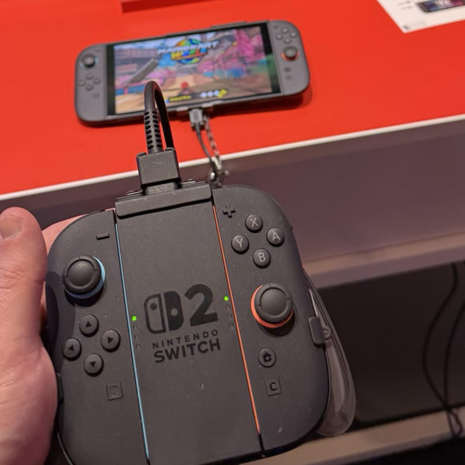 person-holding-nintendo-switch person-holding-nintendo-switch