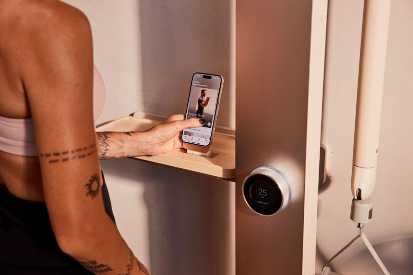 AI-generated workout plan interface on smart home gym equipment