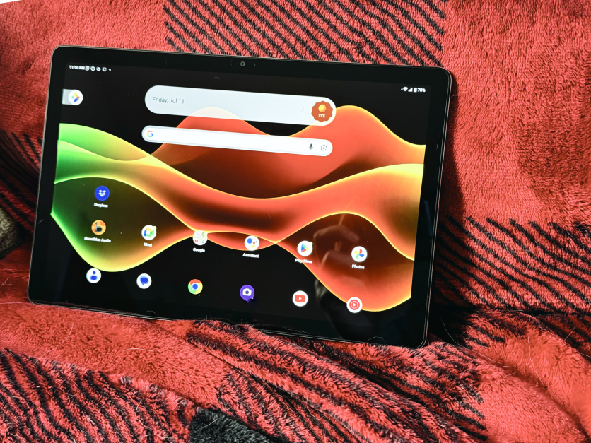 Tablet on blanket showing home screen