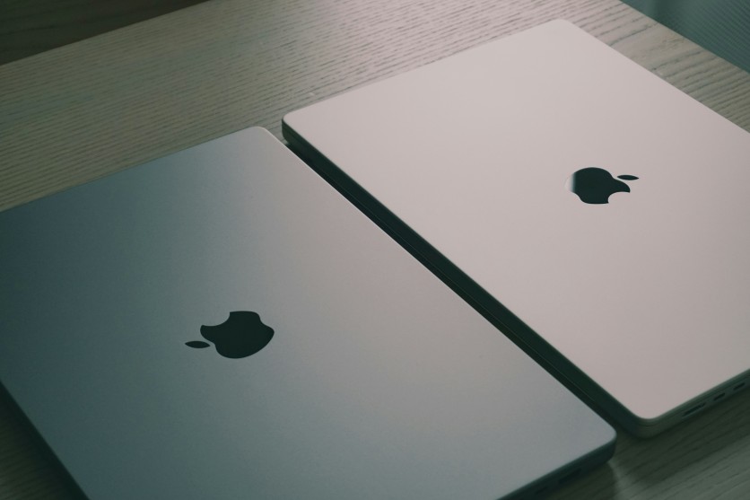2 Apple Laptops on a Table