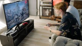 Two Men Playing a Video Game