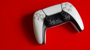 Modern PS5 Controller on Bold Red Background