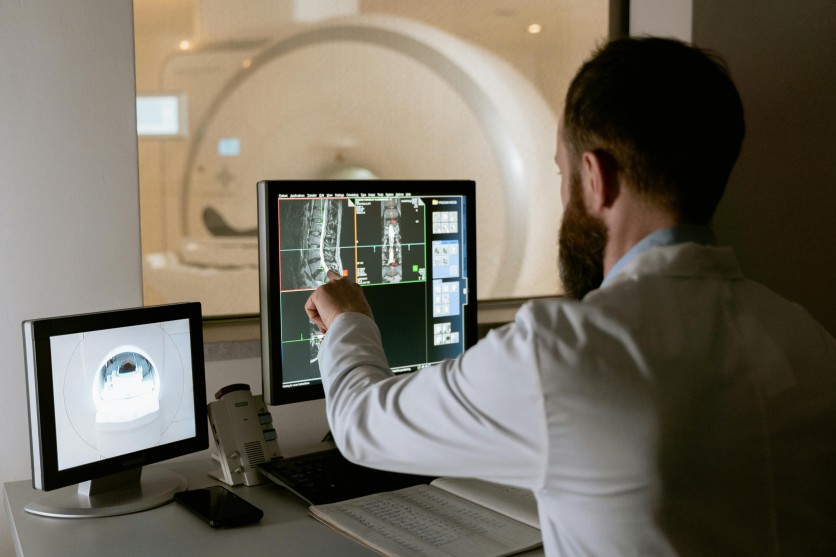 Medical Professional Reviewing MRI Scans