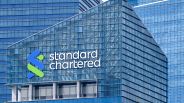 A Standard Chartered signage company signage is seen on a