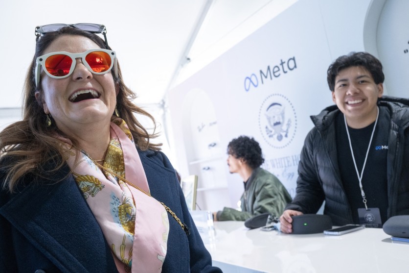 A woman tries Meta smart glasses