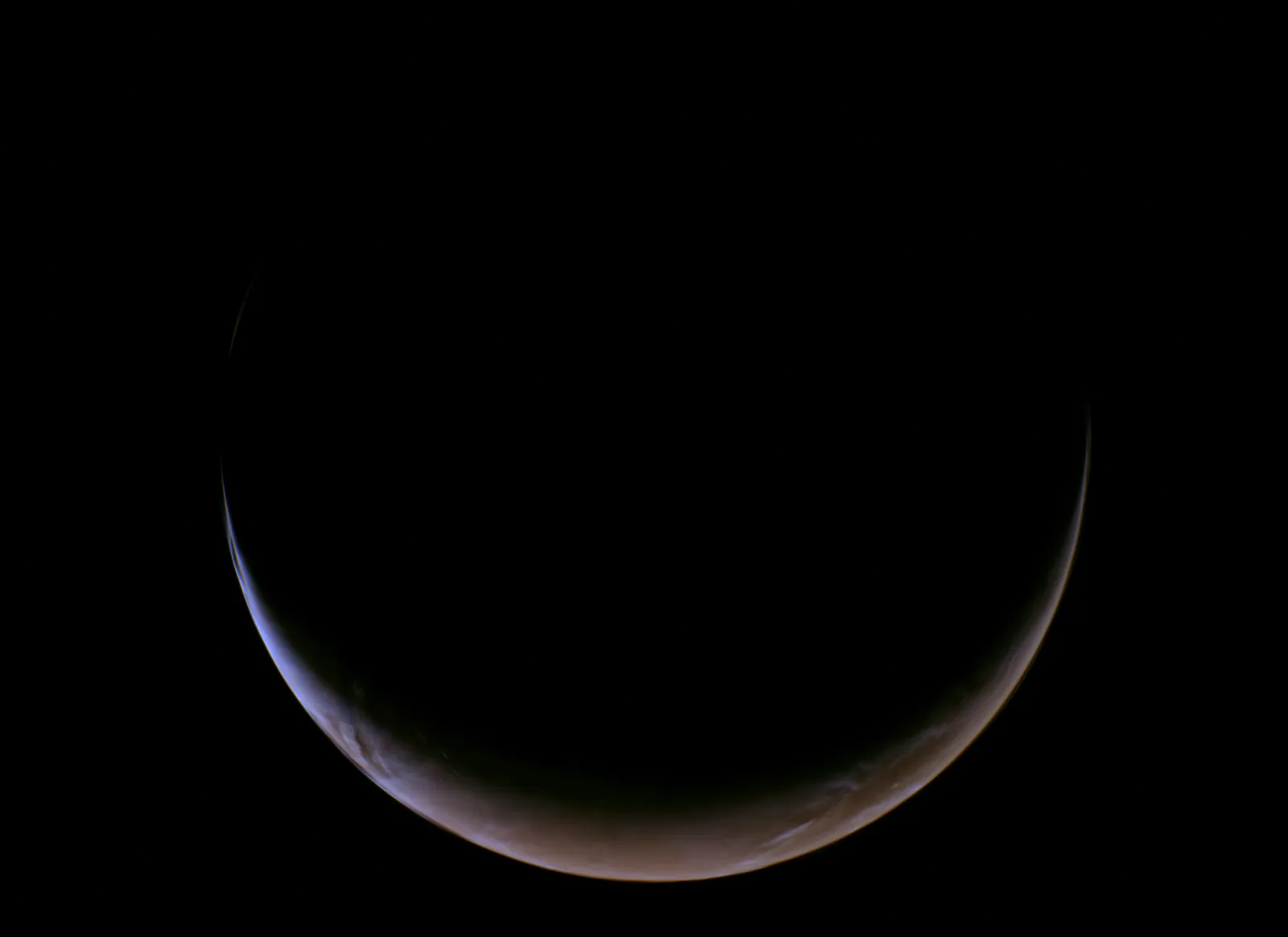 This view of a crescent Mars was captured on May 