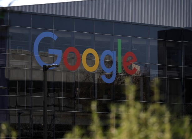 The Google logo is displayed on a building at Google