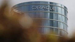 The Oracle logo is displayed on a building at an