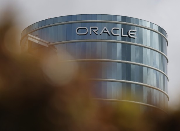The Oracle logo is displayed on a building at an