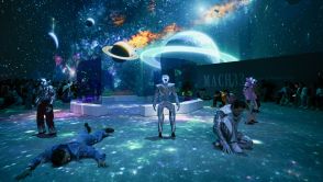 Humanoid robots and models perform as they present creations at