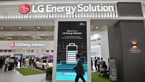 Visitors look at a booth of LG Energy Solution