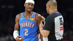 Shai Gilgeous-Alexander and NBA Referee Tony Brothers