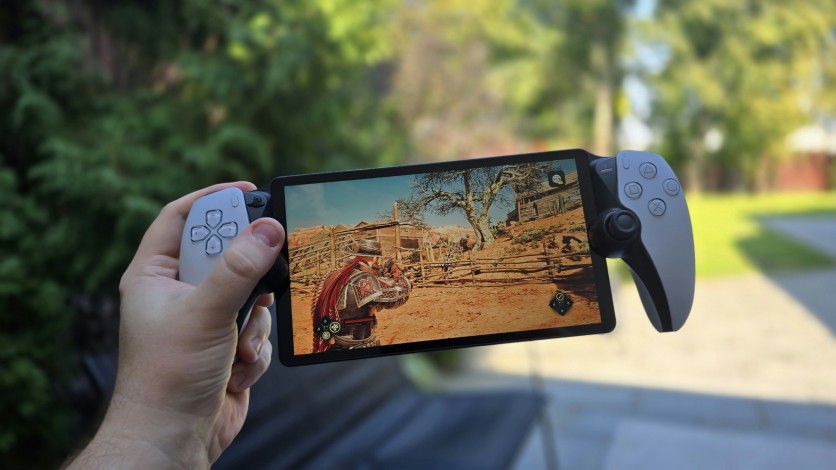 Person Holding Playstation Portal