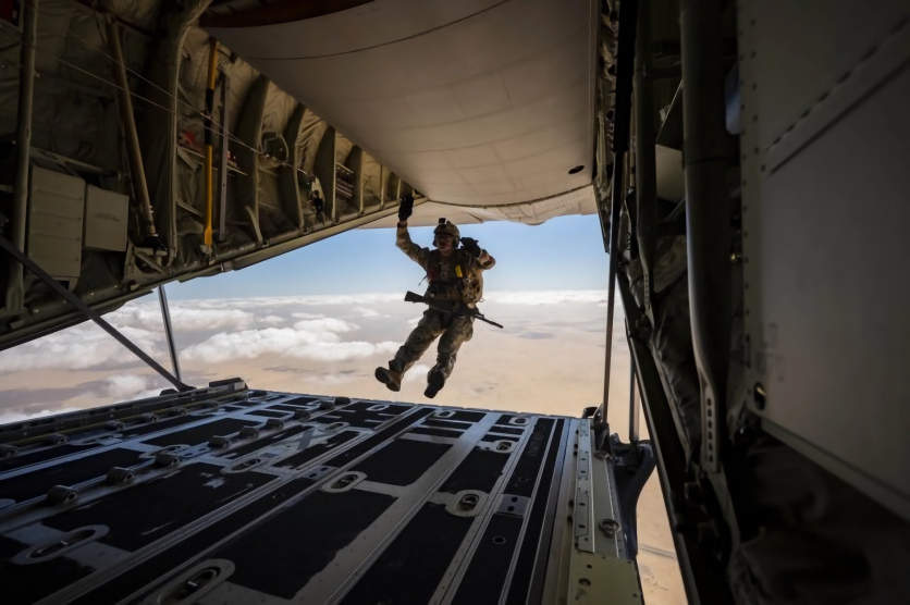 Military Personnel Exiting Aircraft
