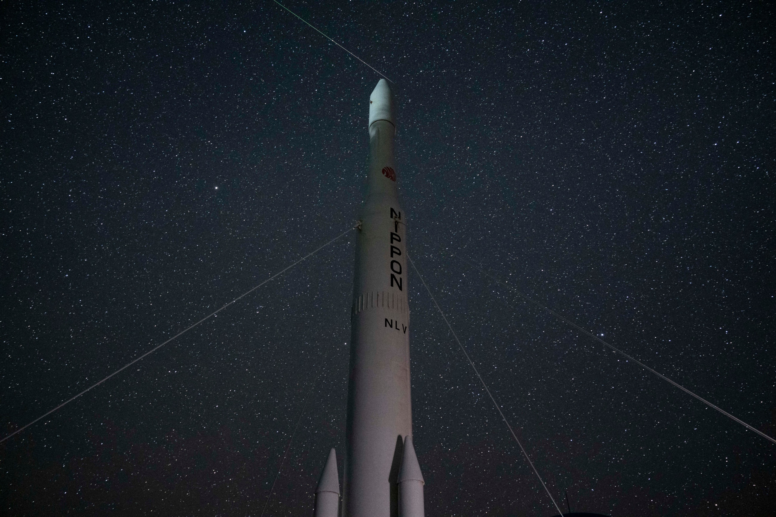 perseid meteor streaks across night sky above
