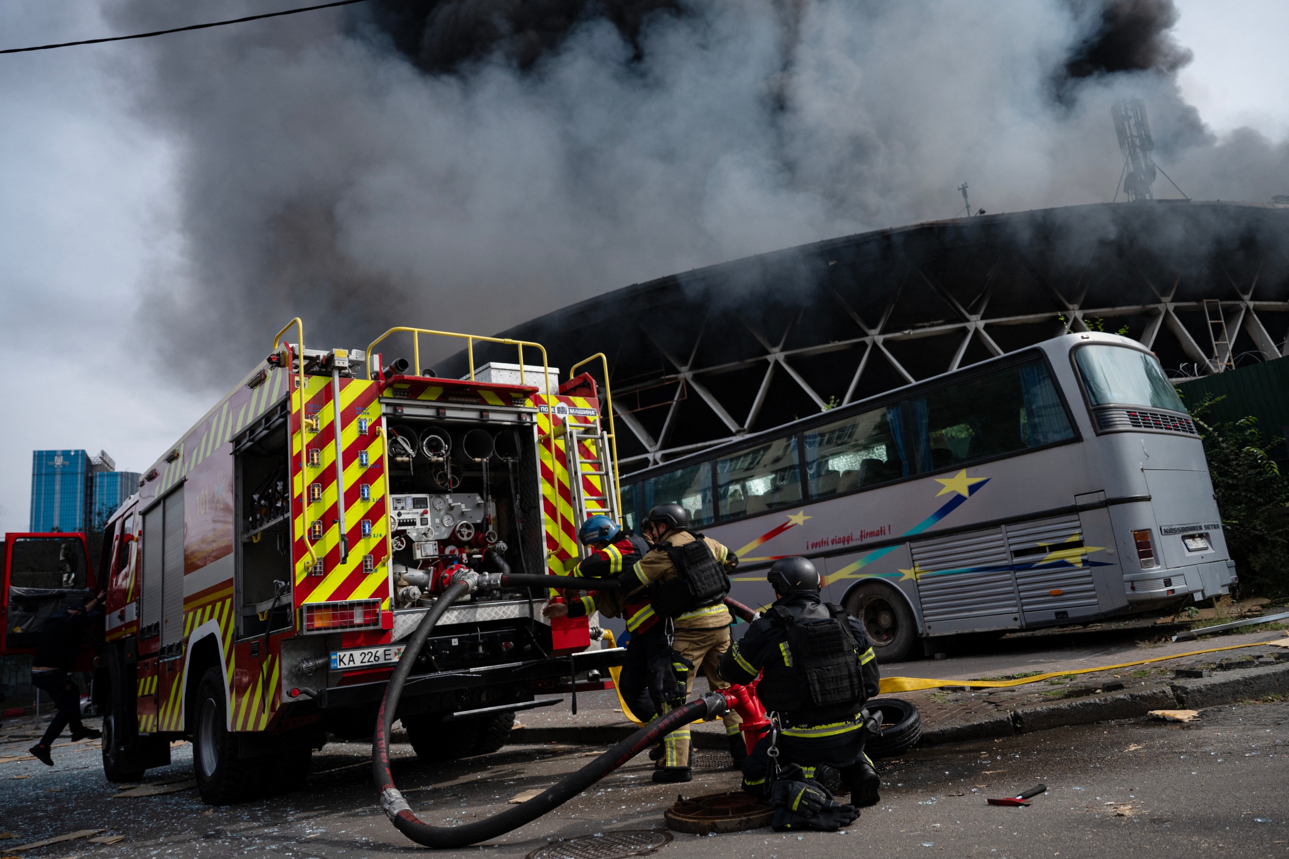 Firefighters extinguish fire building damaged following drone