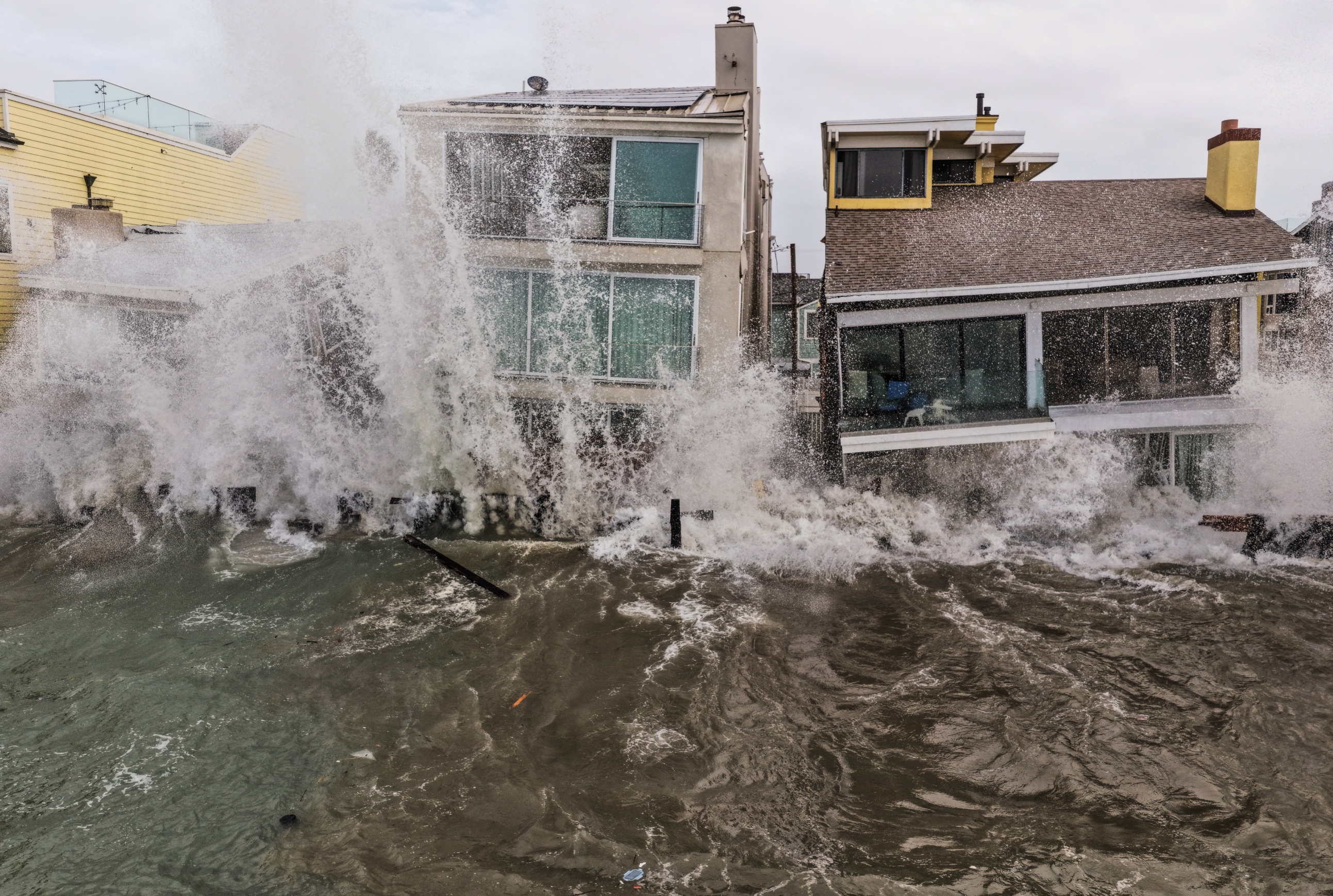 Long Beach Condemns Homes as Rachel Swell Destroys Defenses Stripped by Marie